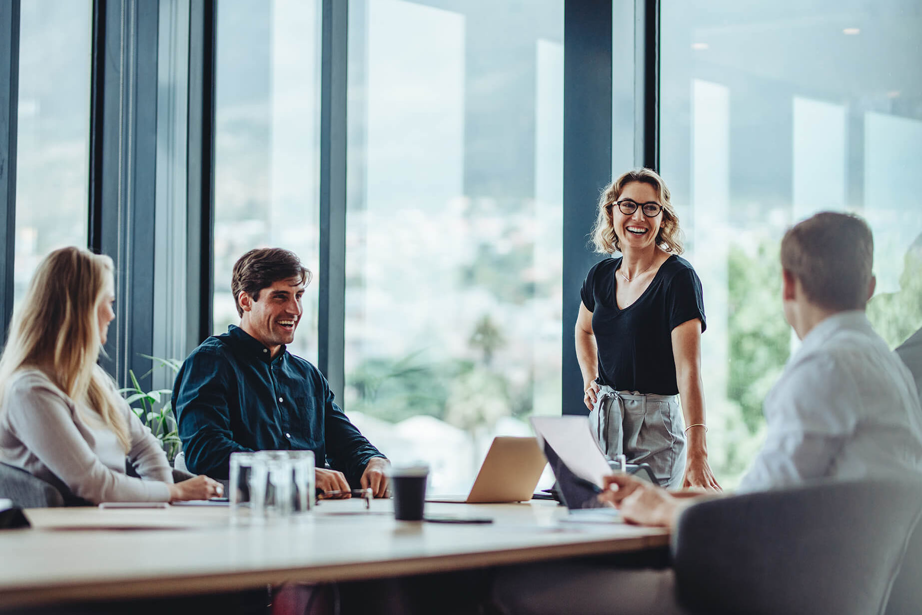 Business people having casual discussion during meeting